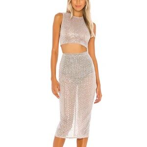 BEATRIZ MIDI SKIRT IN SILVER and FERNANDA CROP TOP IN SILVER
Camila Coelho
